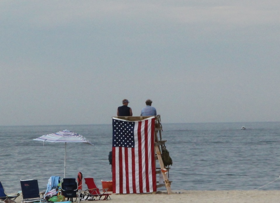 A flag hangs from a lifeguard stand on Belmar beach.